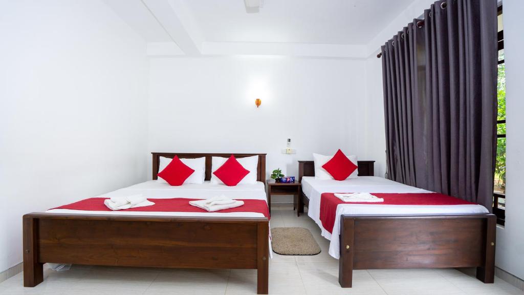 Family Room at Shady Mango Villa β wooden walls with refrigerator and comfortable furnishings