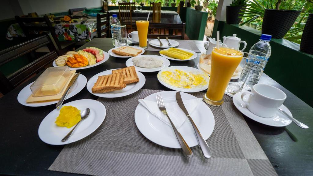 Shady Mango Villa breakfast spread with coffee